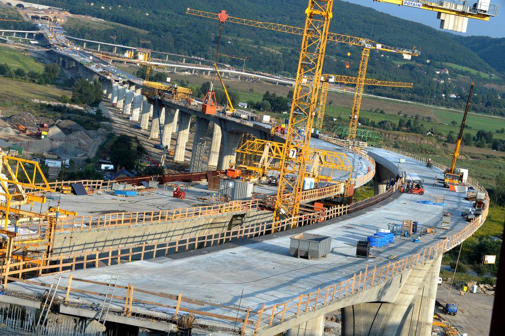 Cranes and concrete viaduct construction on a large civil engineering project